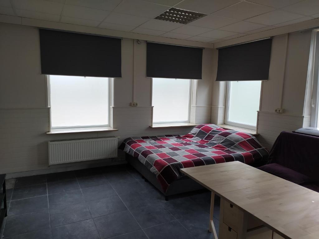 Postel nebo postele na pokoji v ubytování Casa Lommel