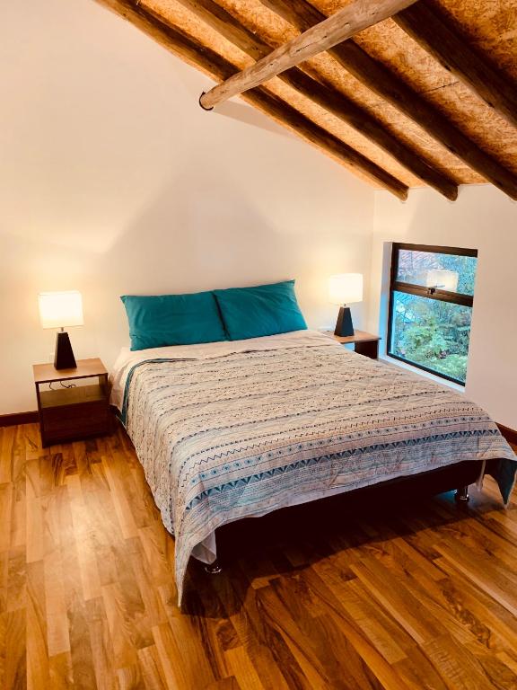 Postel nebo postele na pokoji v ubytování Bellisimo chalet en Zona Colonial (302)