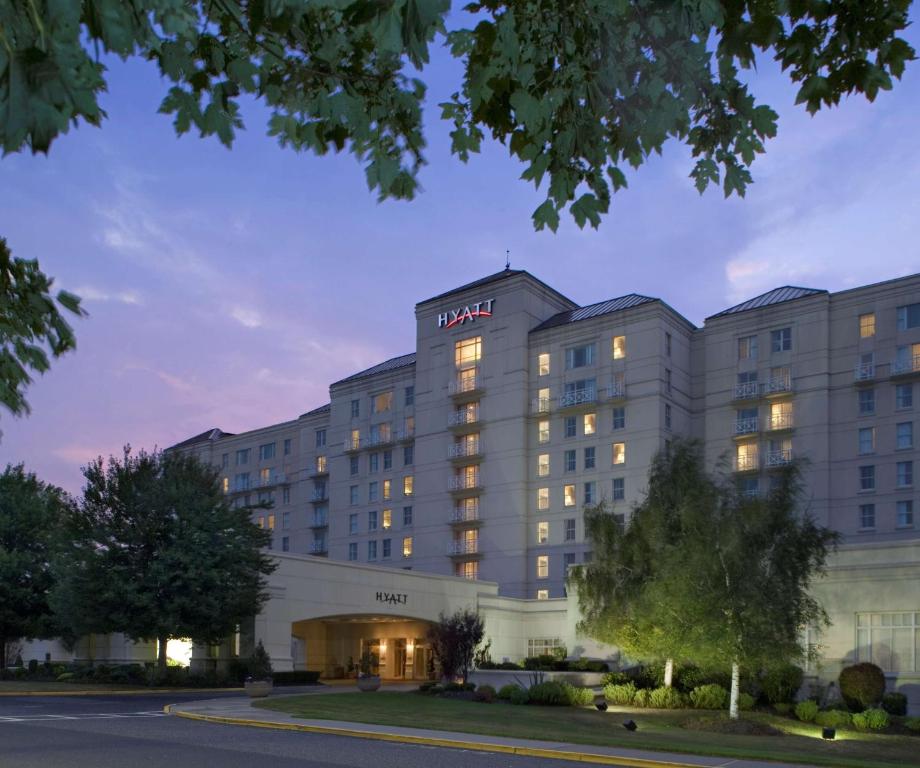 a rendering of a hotel at night at Hyatt Regency Long Island in Hauppauge