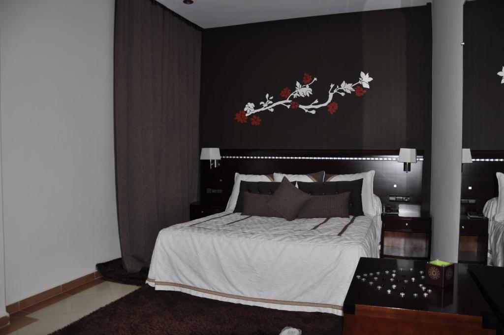 Postel nebo postele na pokoji v ubytování Dream's Hotel