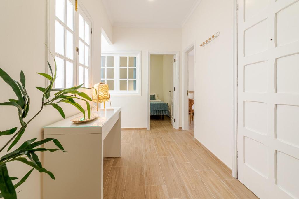 Postel nebo postele na pokoji v ubytování Flatguest Amate