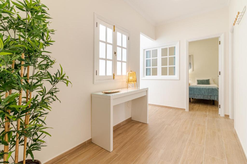 Postel nebo postele na pokoji v ubytování Flatguest Amate