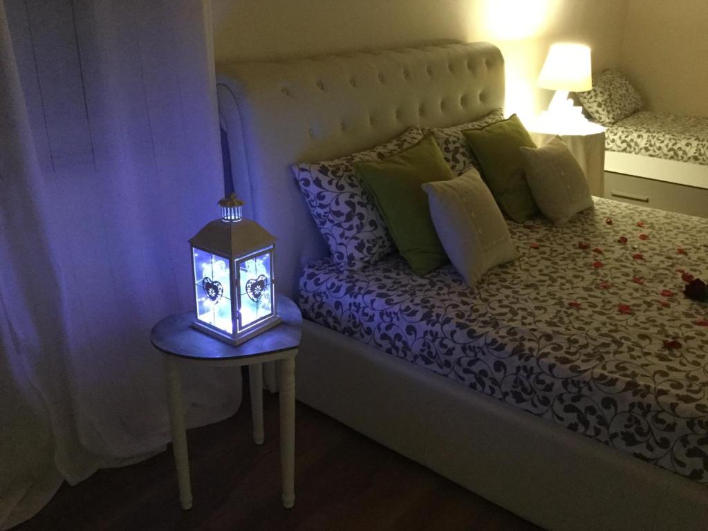 Postel nebo postele na pokoji v ubytování B&B CORTE SANT'ANGELO