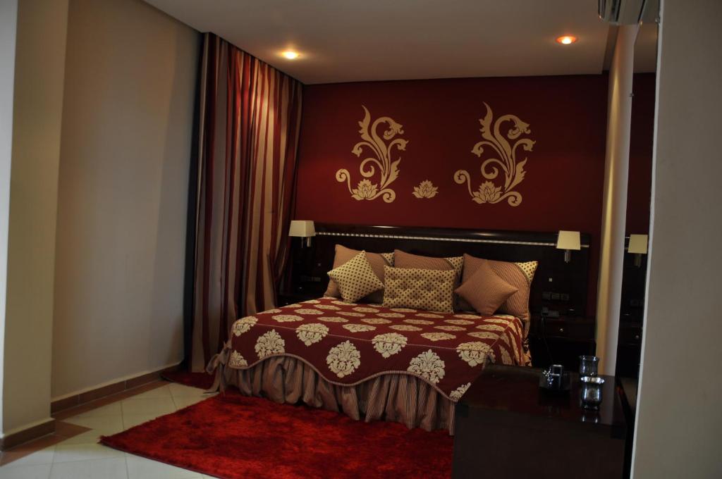 Postel nebo postele na pokoji v ubytování Dream's Hotel