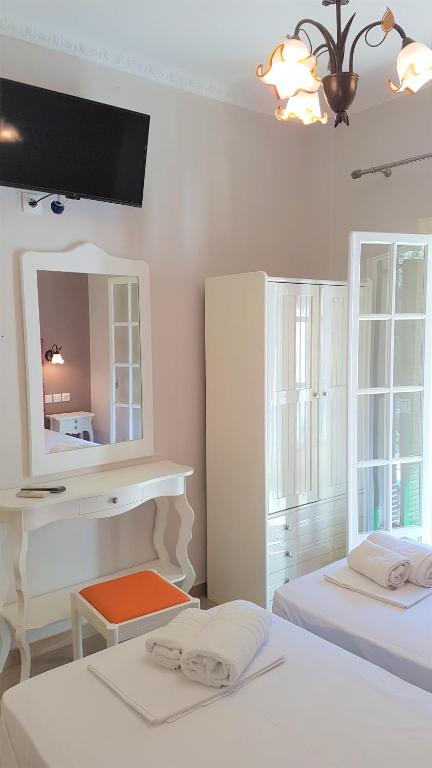 Llit o llits en una habitació de Dimitris Residence 2 Kalami bay