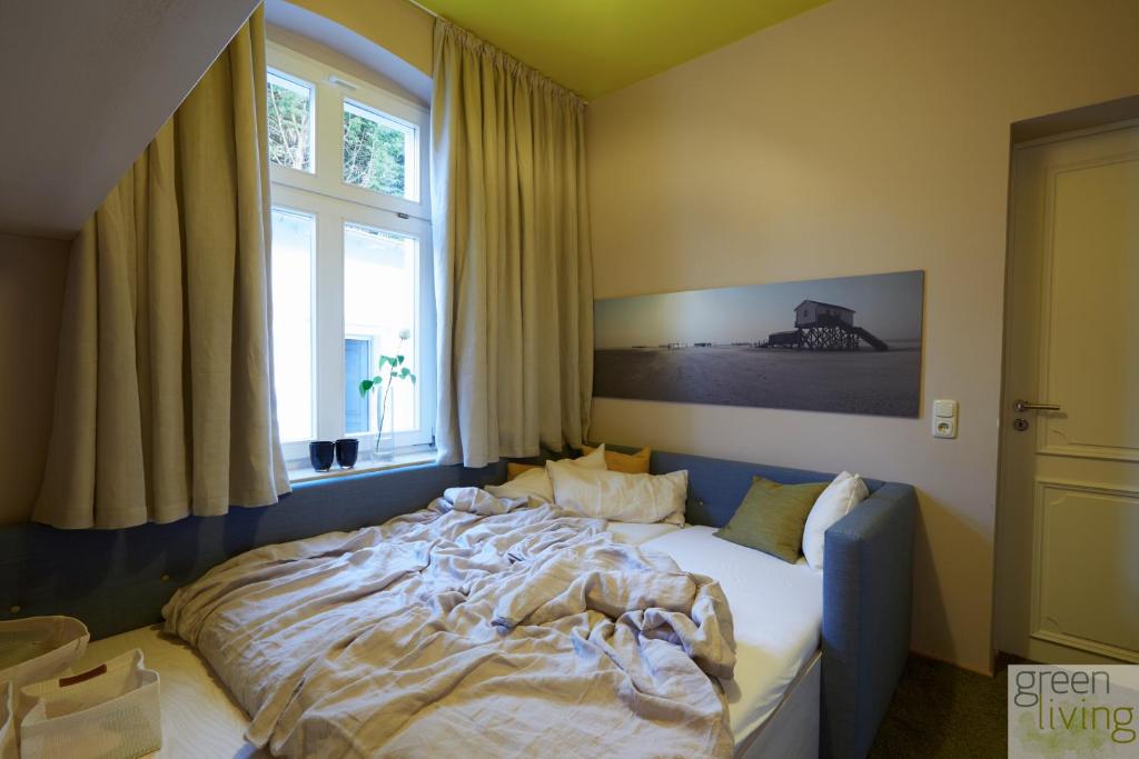 Postel nebo postele na pokoji v ubytování Villa Franz