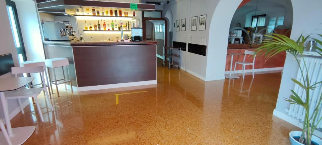 Kuchyň nebo kuchyňský kout v ubytování Hotel Sirena