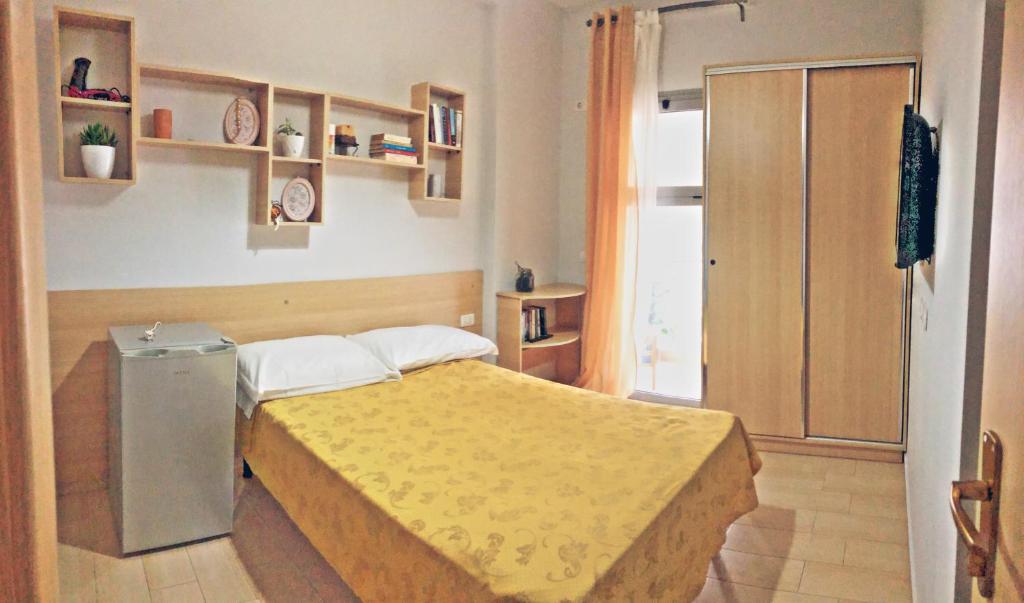 Postel nebo postele na pokoji v ubytování Arianiti Guesthouse