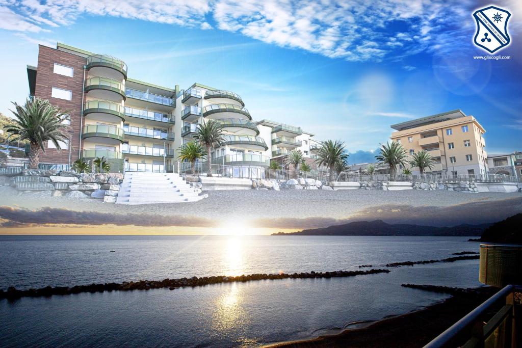 an architectural rendering of a building next to the water at Gli Scogli Luxury Residence Hotel in Chiavari