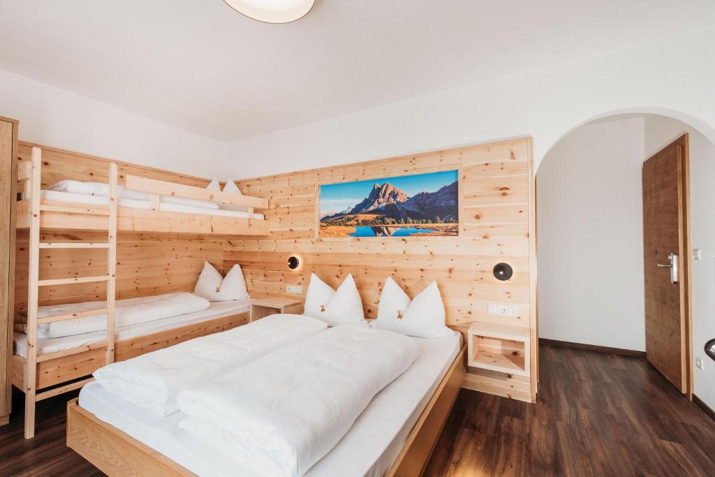 Postel nebo postele na pokoji v ubytování Pension Sonnenhof