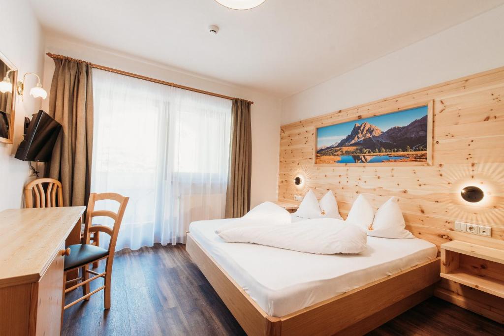 Postel nebo postele na pokoji v ubytování Pension Sonnenhof