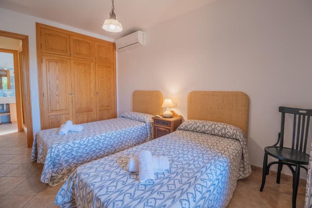 Postel nebo postele na pokoji v ubytování Finca VELA 2 by Mallorca Villa Selection