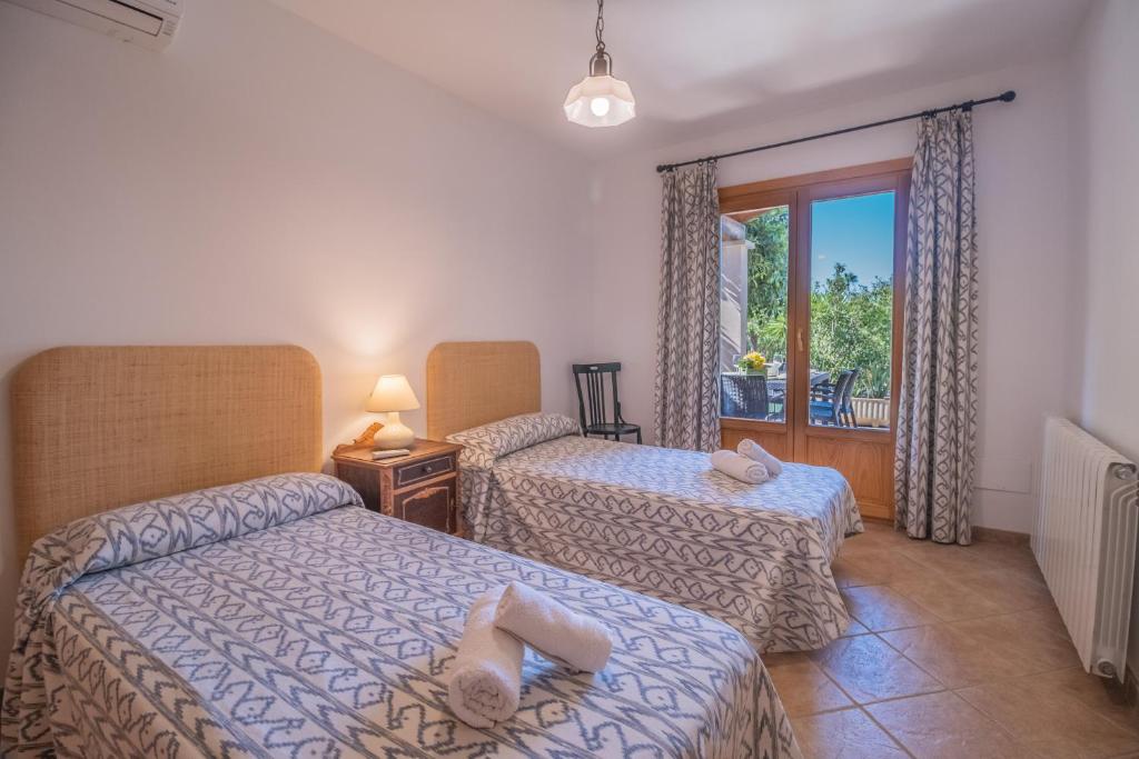 Postel nebo postele na pokoji v ubytování Finca VELA 2 by Mallorca Villa Selection