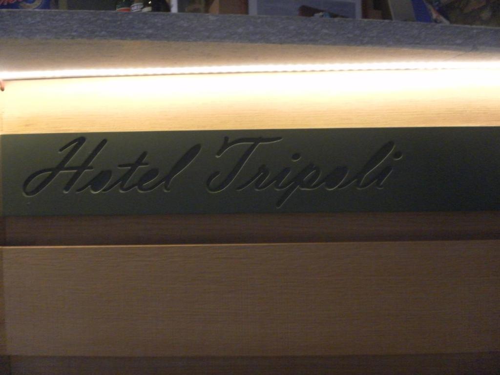 a wooden drawer with the name of a hotel trililli at Hotel Tripoli La Margherita in Limone Piemonte