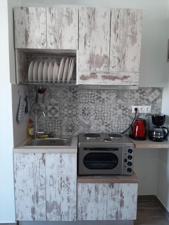 Kuchyň nebo kuchyňský kout v ubytování Central Mark Loft