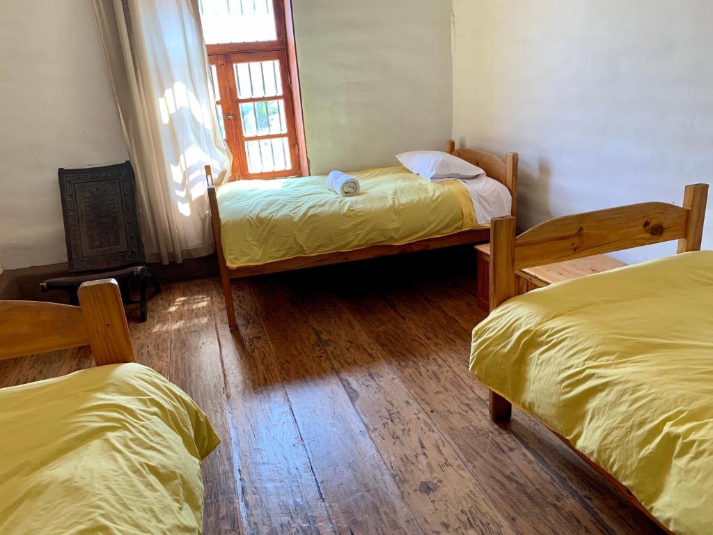 Postel nebo postele na pokoji v ubytování Refugio de Santiago Ecolodge