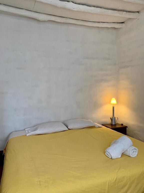 Postel nebo postele na pokoji v ubytování Refugio de Santiago Ecolodge