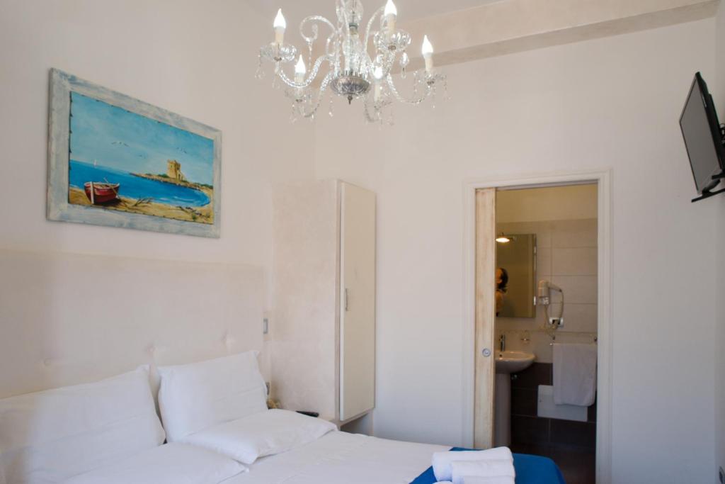 Postel nebo postele na pokoji v ubytování Baia Di Torre Squillace