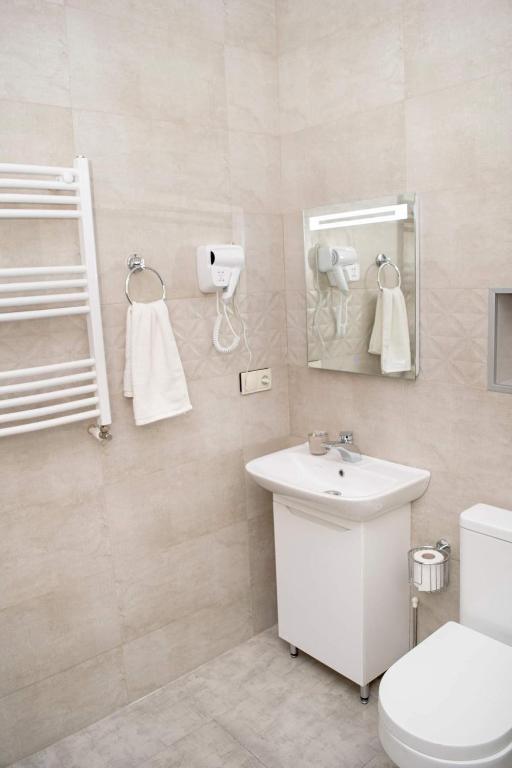 Koupelna v ubytování 4 Rooms