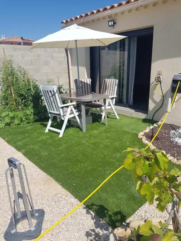 O grădină în afara Chambre chez Ikrame