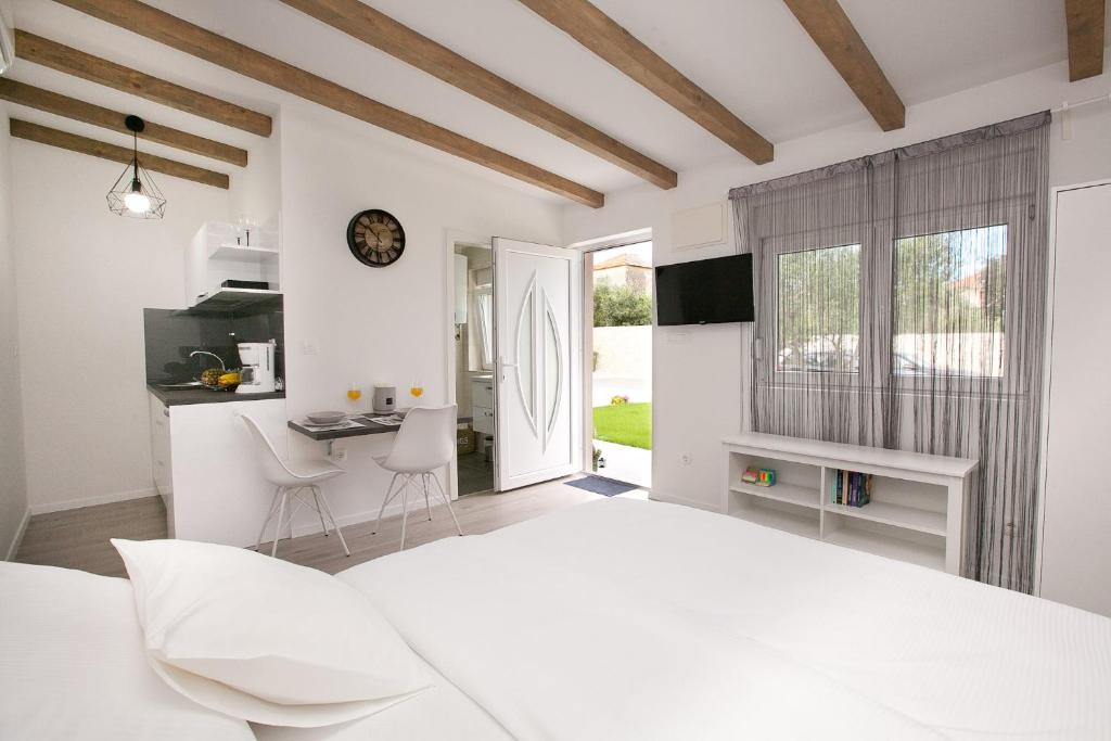 Posteľ alebo postele v izbe v ubytovaní Studio apartments Tara