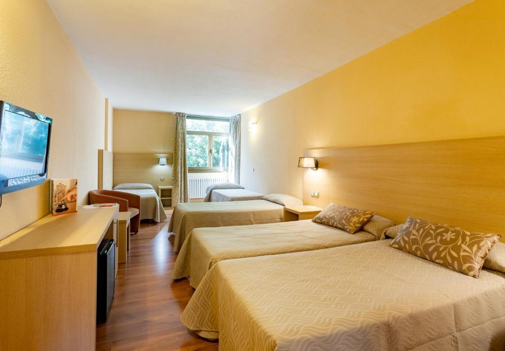 Letto o letti in una camera di Hotel Panorama
