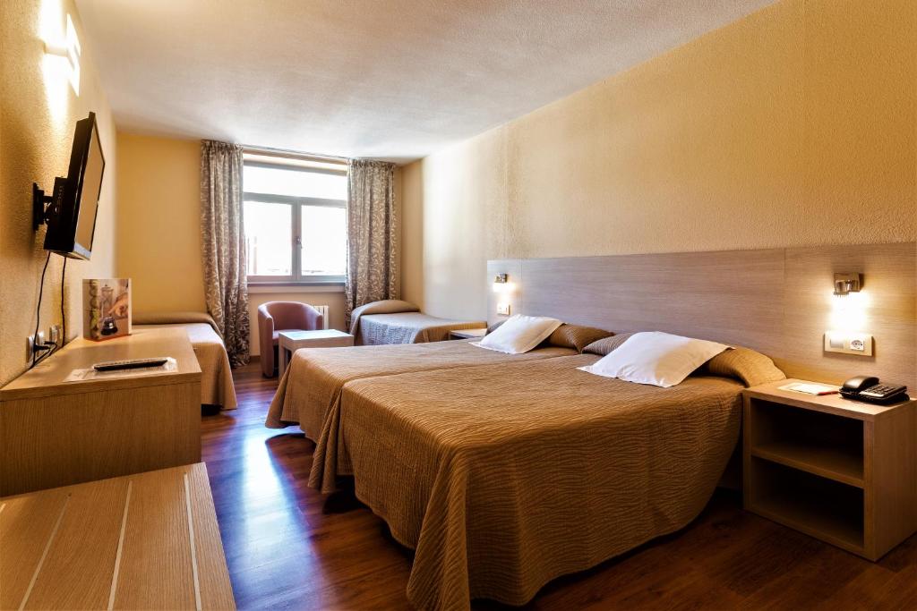 Letto o letti in una camera di Hotel Panorama