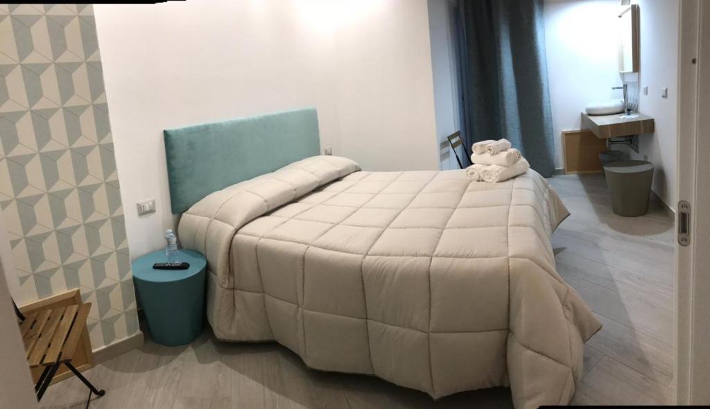 Posteľ alebo postele v izbe v ubytovaní Guest house Regina Margherita