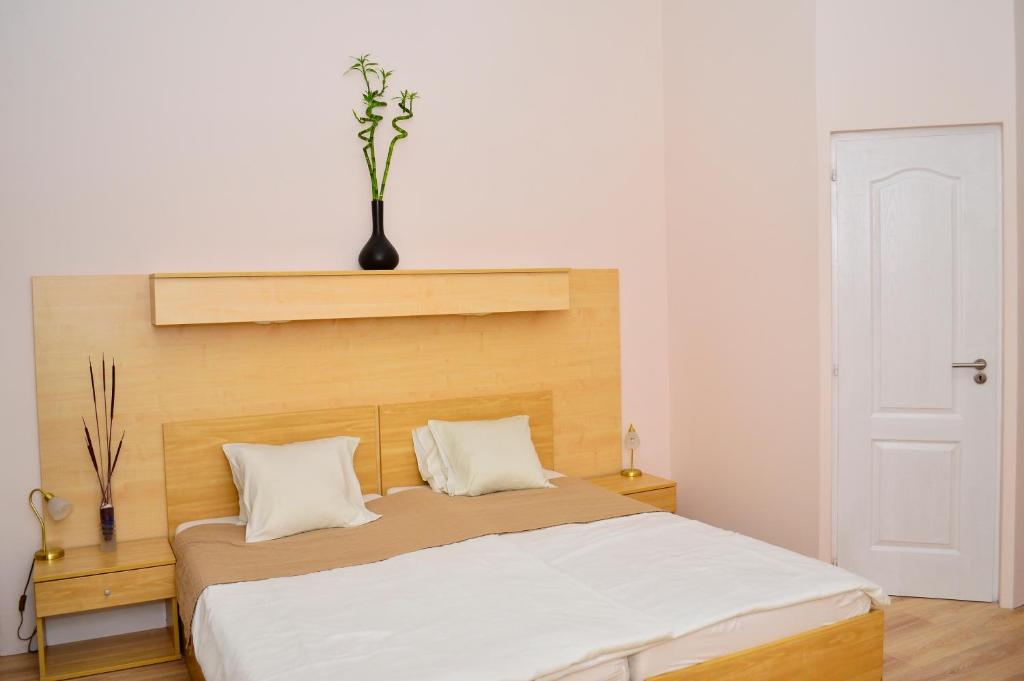 Posteľ alebo postele v izbe v ubytovaní Centrooms House