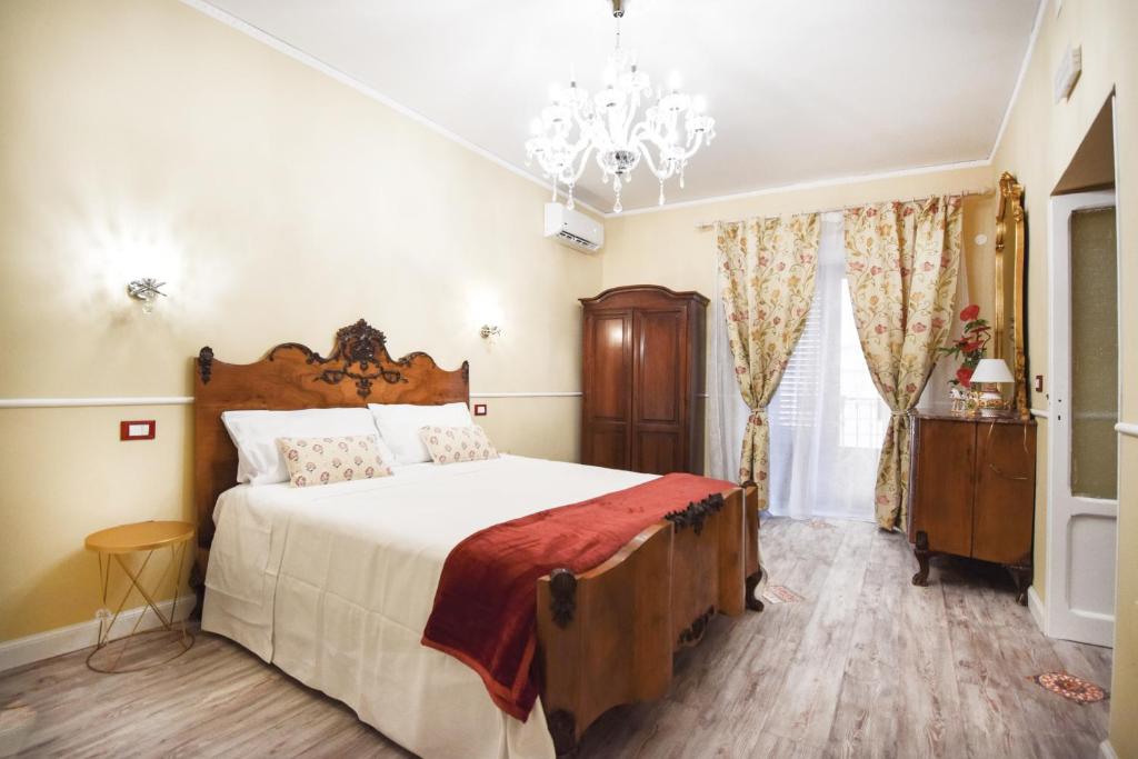 Luxury Apartment Via Genova tesisinde bir odada yatak veya yataklar