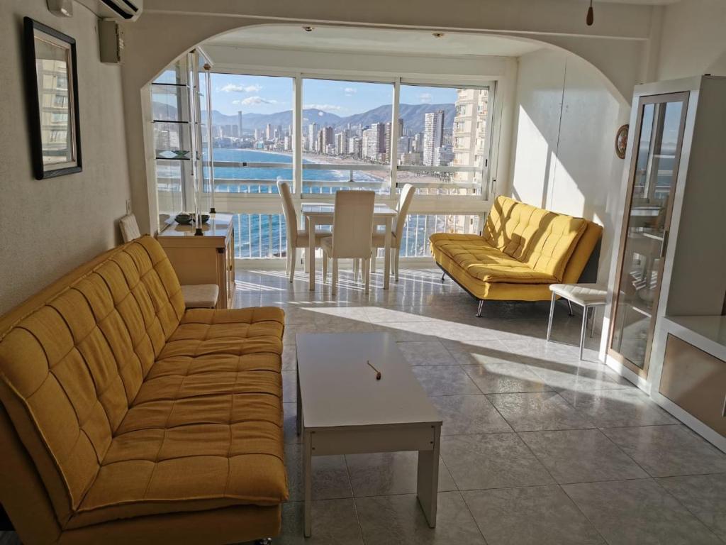 a living room with a couch and a table at Apartment Levante in Benidorm