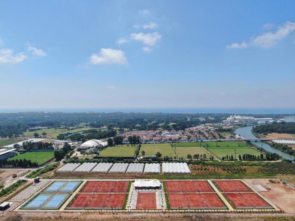 an overhead view of a farm with solar panels at Megasaray Club Belek in Belek