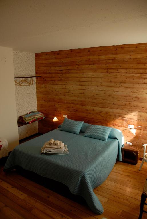 Postel nebo postele na pokoji v ubytování Agriturismo Paradiso41