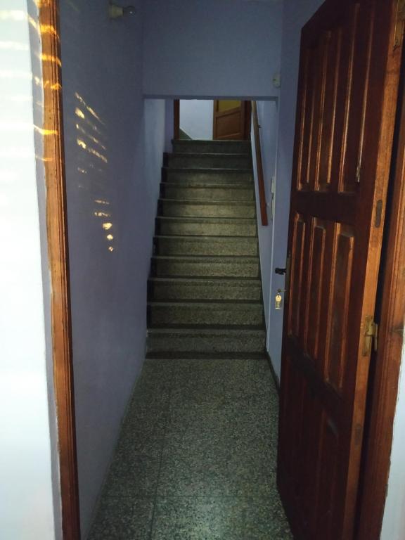 a stairway leading up to a set of stairs at DOÑA OLGA in Minas