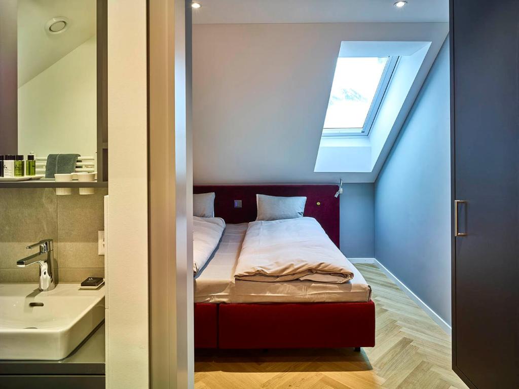 Voodi või voodid majutusasutuse Bellevue-Terminus - Urban Lifestyle Hotel toas