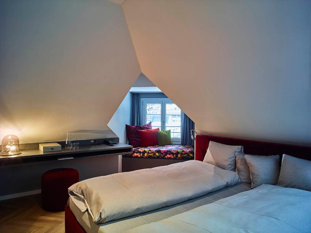 Voodi või voodid majutusasutuse Bellevue-Terminus - Urban Lifestyle Hotel toas