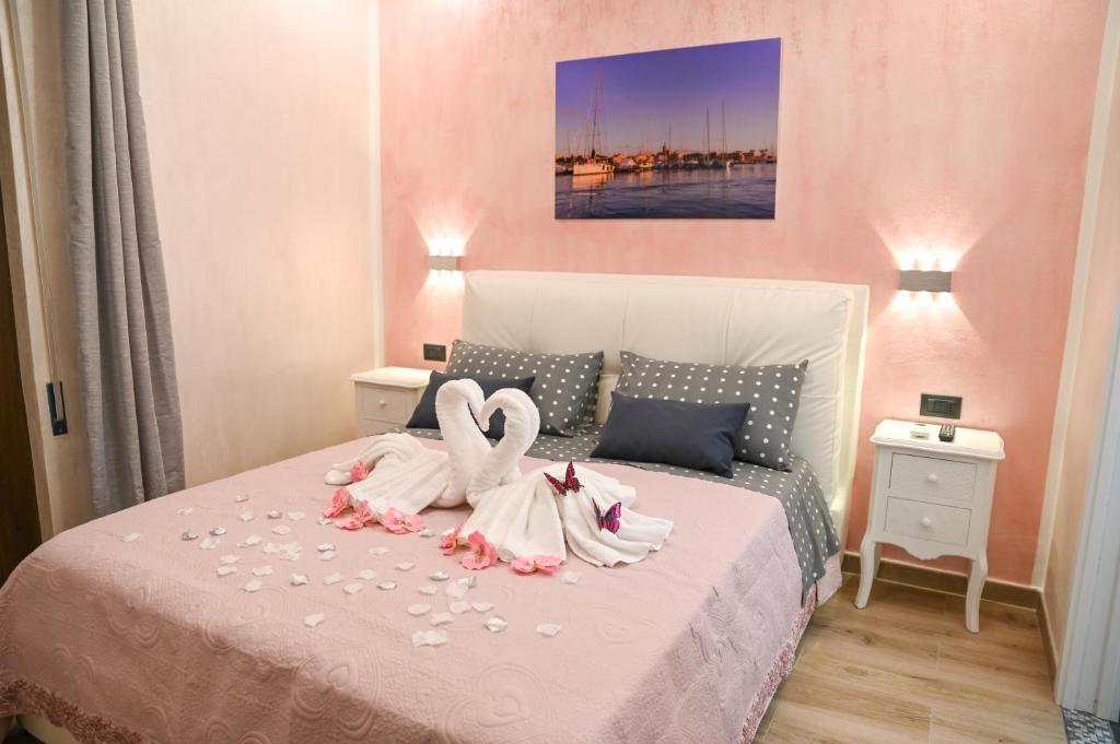 Postel nebo postele na pokoji v ubytování Don Giovanni