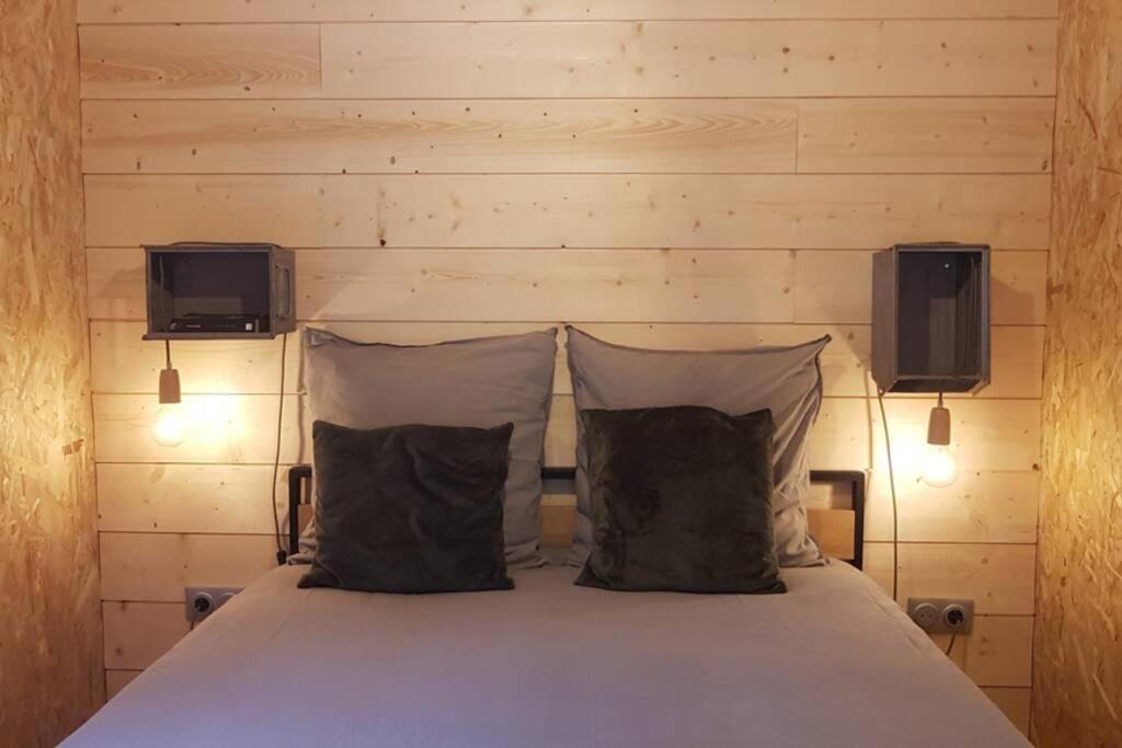 Postel nebo postele na pokoji v ubytování Une pause là-haut!