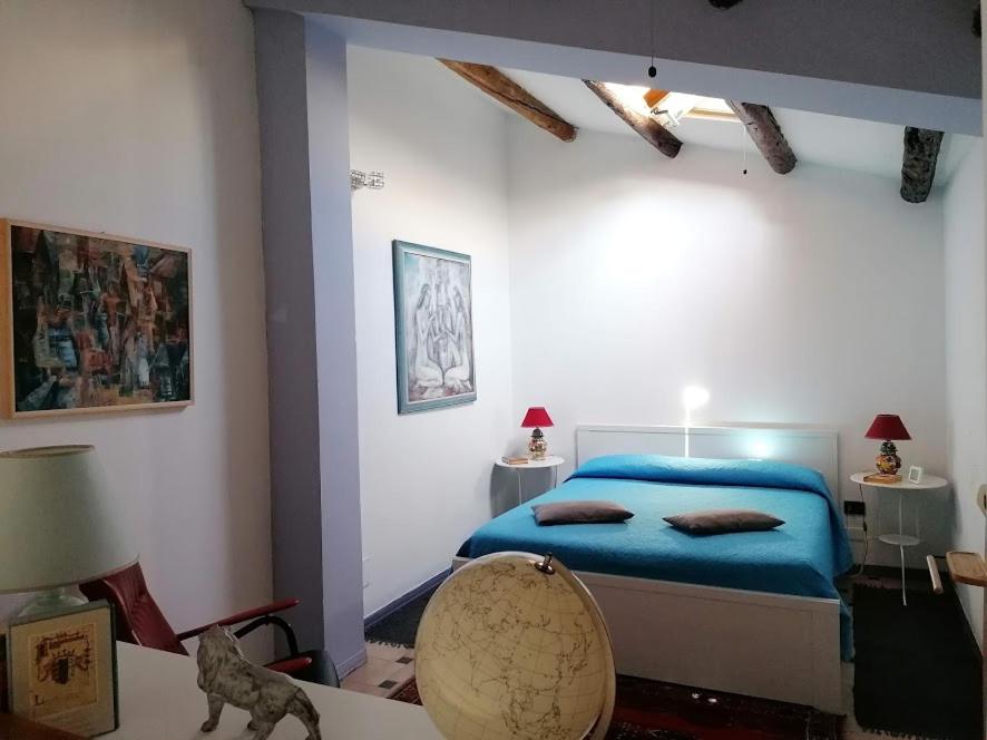En eller flere senger på et rom på La Casa di Beatrice