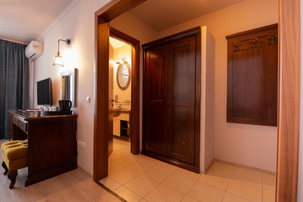 TV a/nebo společenská místnost v ubytování Hotel Wien