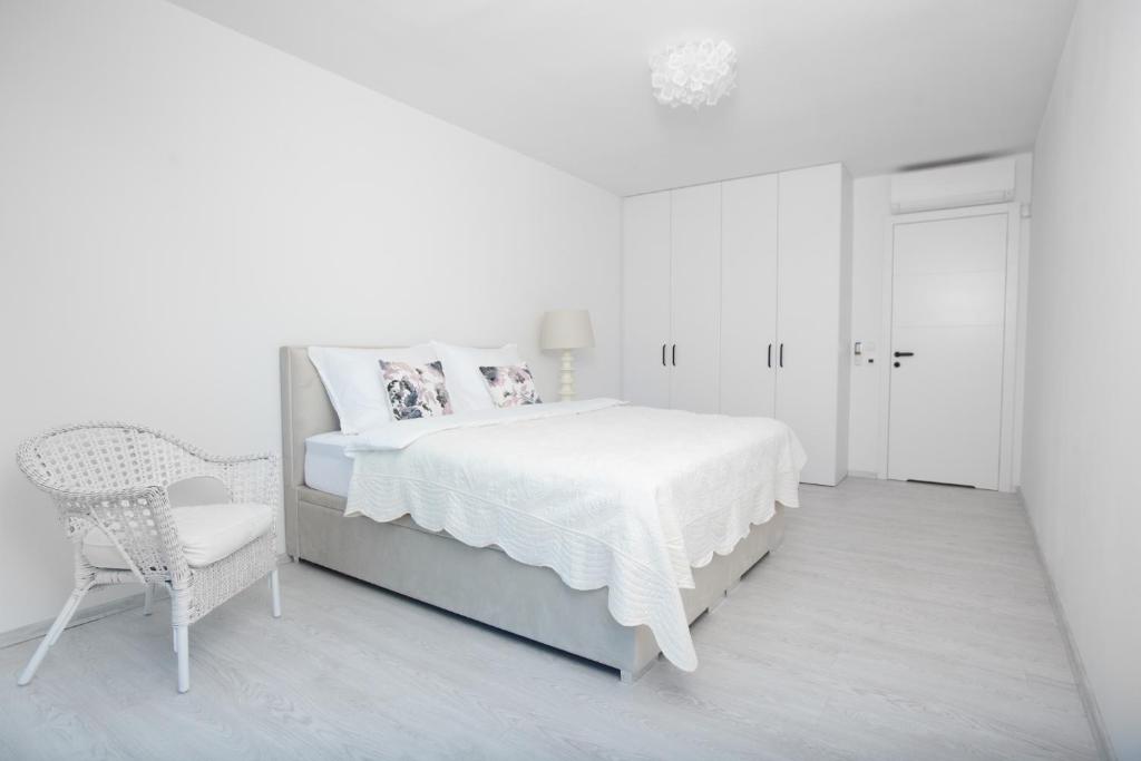 Postel nebo postele na pokoji v ubytování TERVEYS residence