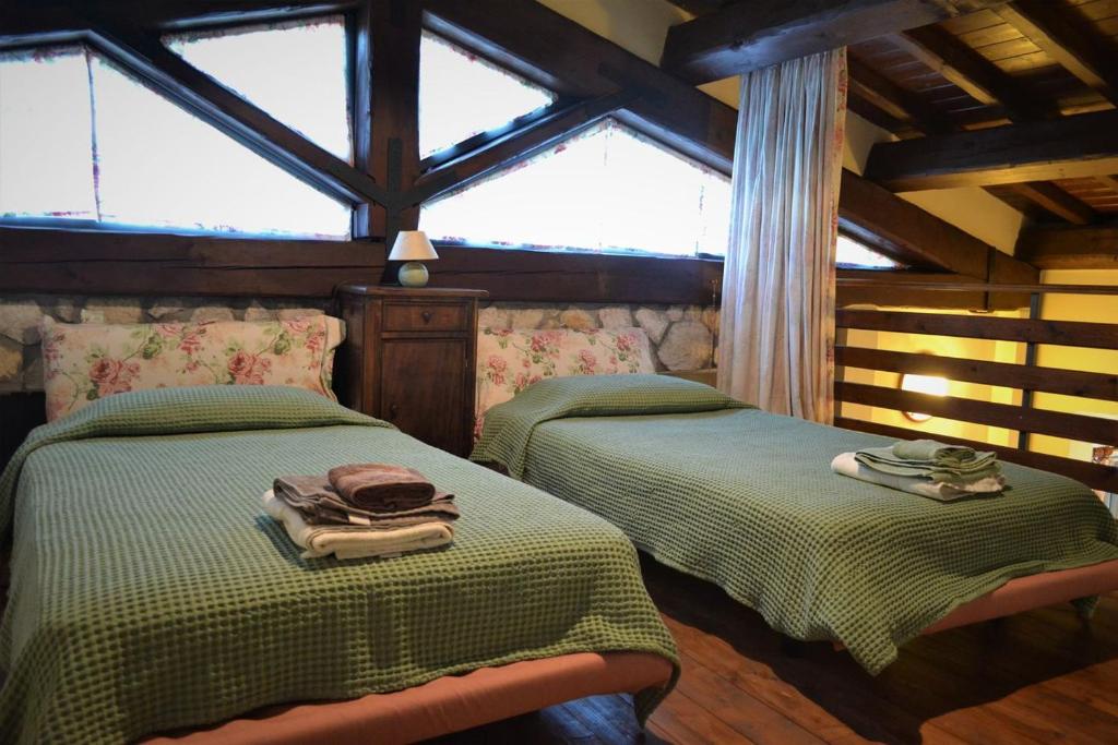 Posteľ alebo postele v izbe v ubytovaní Agriturismo Selvapiana