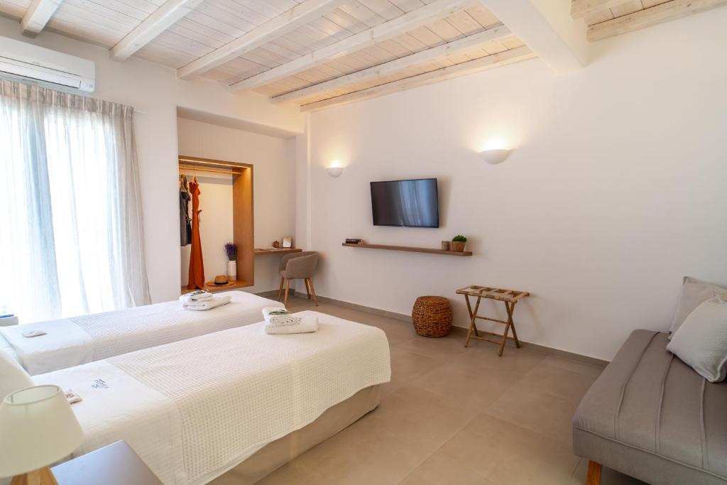 Voodi või voodid majutusasutuse Vincenzo Family Rooms toas