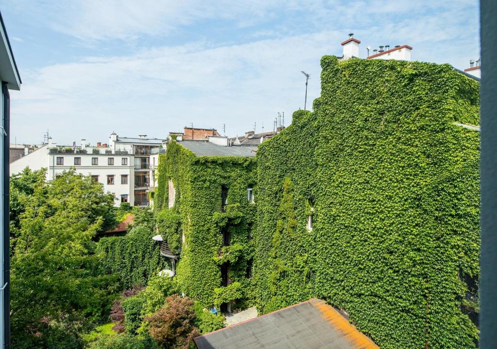 Vonkajšia záhrada v ubytovaní Aparthotel Cracovia Residence