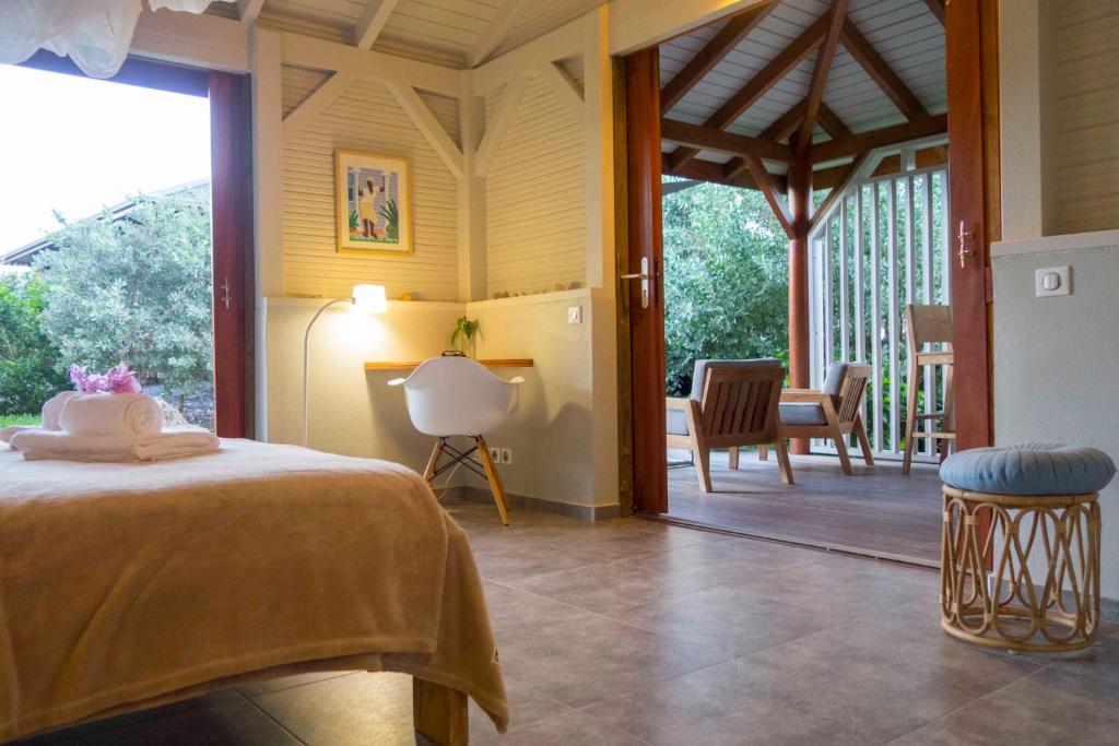 Postel nebo postele na pokoji v ubytování Shambala Lodge