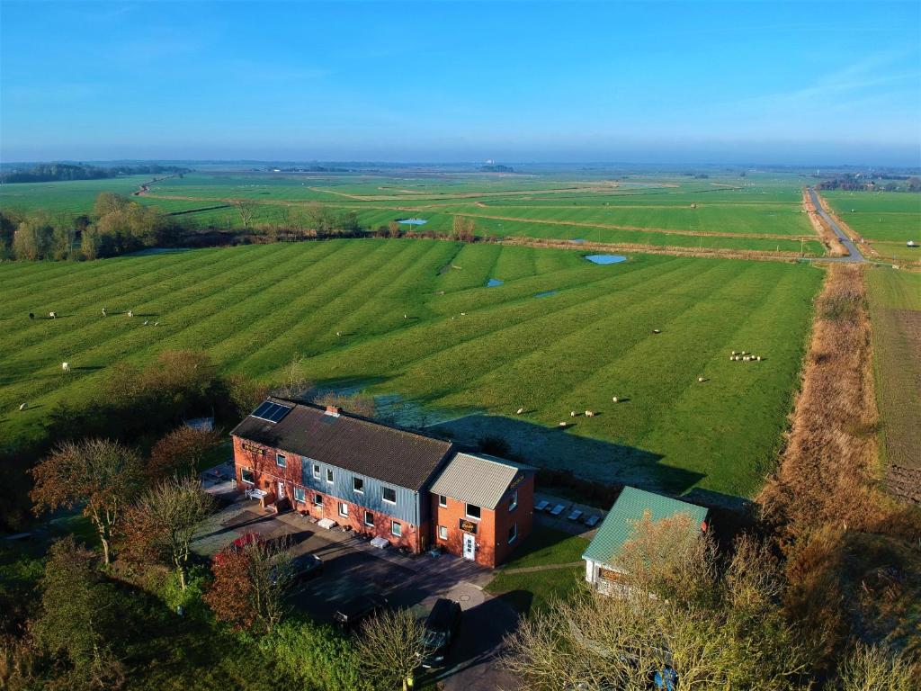 an aerial view of a barn in a field at Seerose Boutique-Pension in Tating