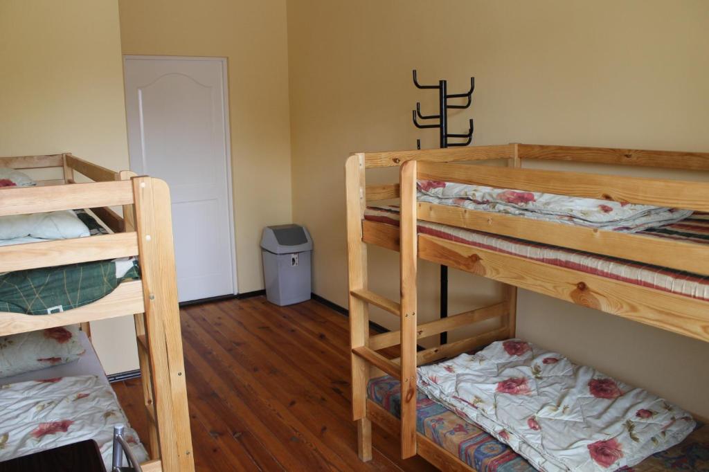 Postel nebo postele na pokoji v ubytování Fortuna Hostel