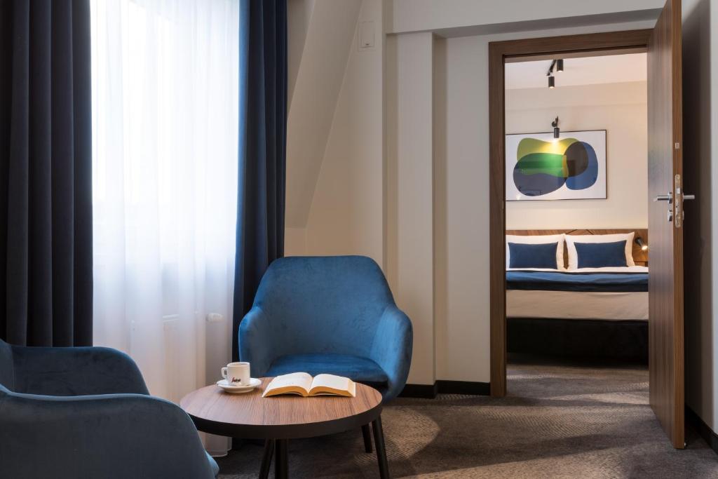 Posteľ alebo postele v izbe v ubytovaní Ascot Premium Hotel