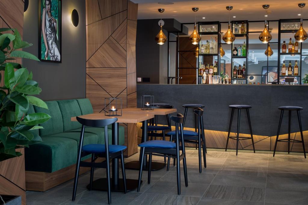Posedenie v ubytovaní Ascot Premium Hotel