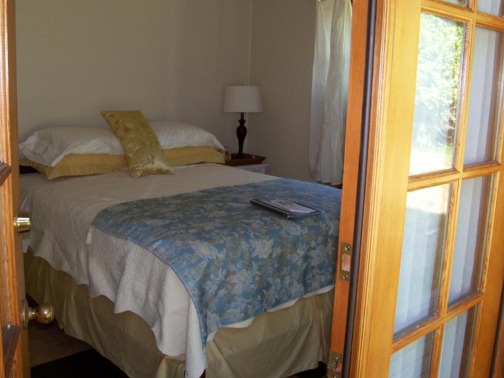Postel nebo postele na pokoji v ubytování Stewart House Hotel